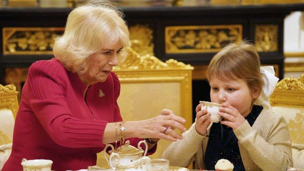 Queen Camilla hosts Windsor Castle afternoon tea for girl with brain tumour