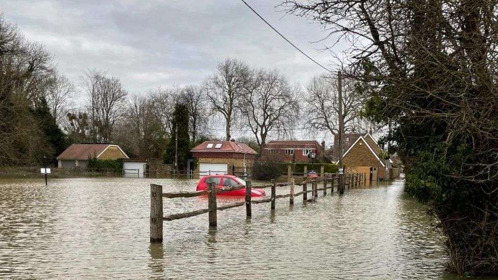 Surrey floods: Dozens of people evacuated or led to safety