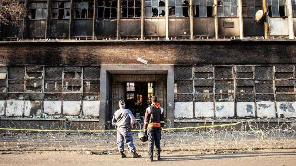 Man held for murder over South Africa building fire