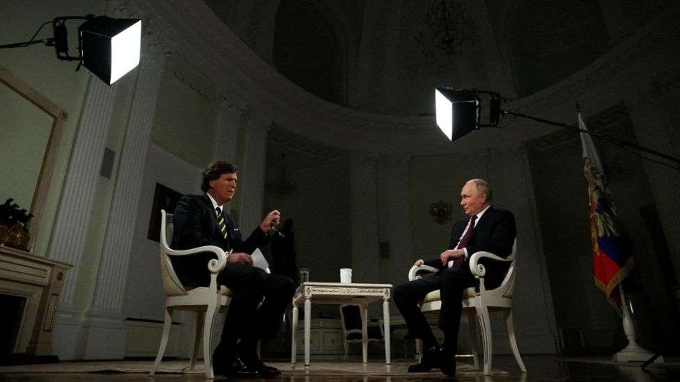 Tucker Carlson: Putin takes charge as TV host gives free rein to Kremlin