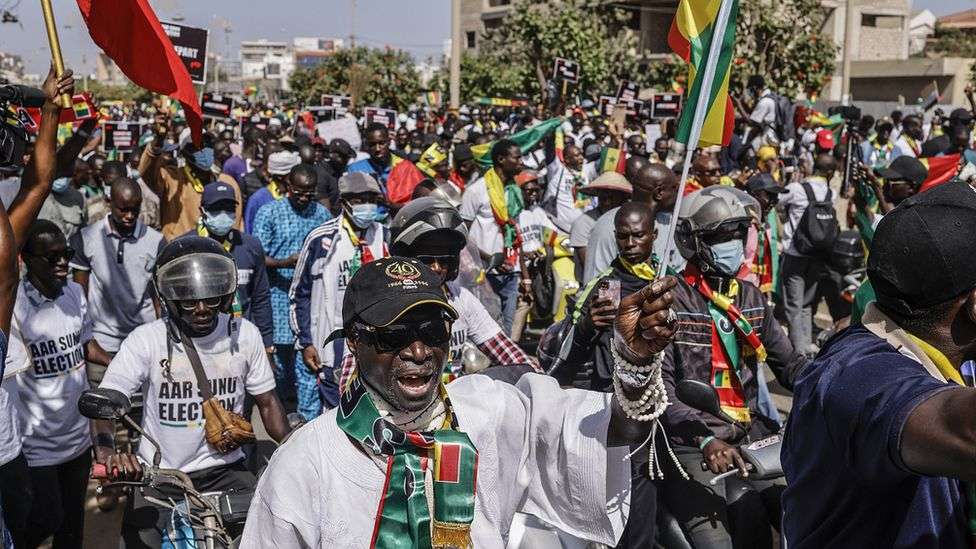 Senegal election: Opposition supporters march in Dakar calling for swift vote