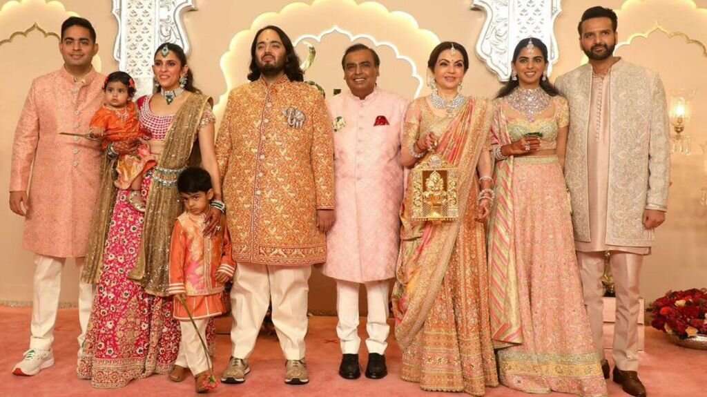 India tycoon Ambani’s son sets off in grand wedding procession