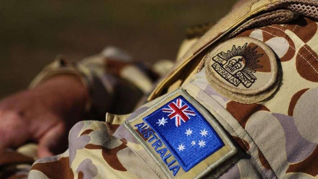 Australia strips officers' medals for war crimes culture