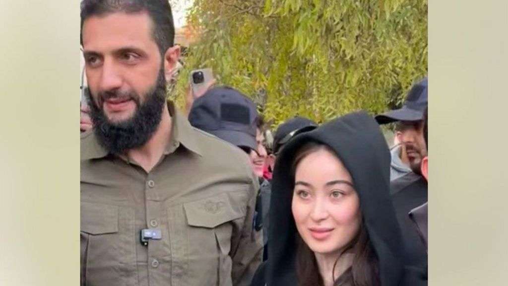 Syria rebel leader dismisses controversy over photo with woman
