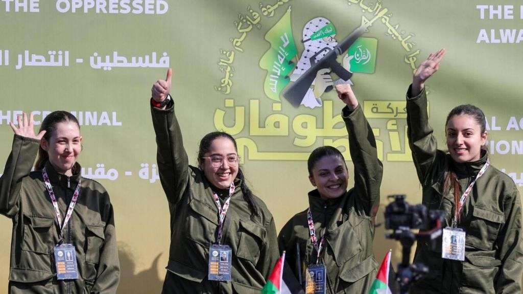 Four Israeli hostages released by Hamas in carefully staged handover