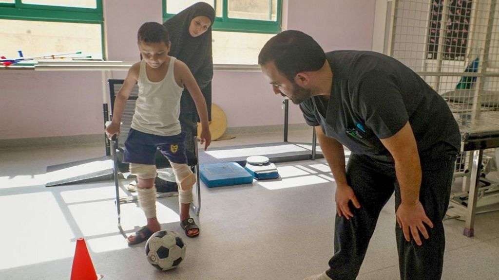Injured Gazan boy takes first steps after surgery in Jordan