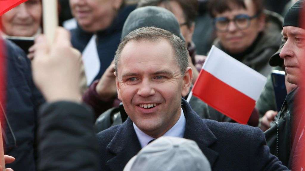 Polish presidential candidate ridiculed for donning disguise to promote book