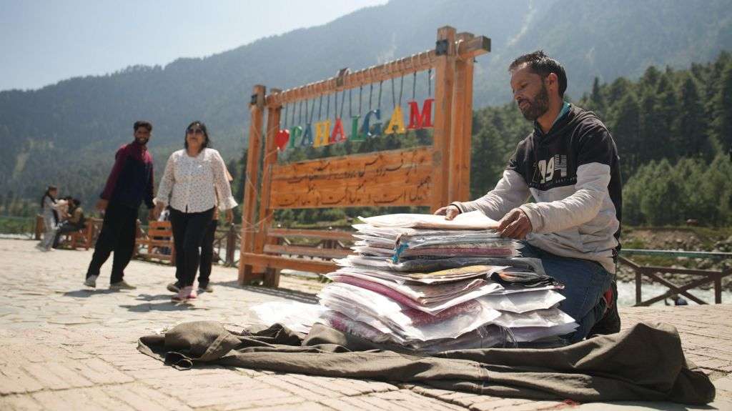 Hope and fear as tourists trickle back to Kashmir town after attack