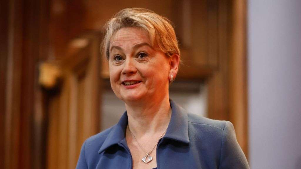 Cooper backs PM over 'island of strangers' remark