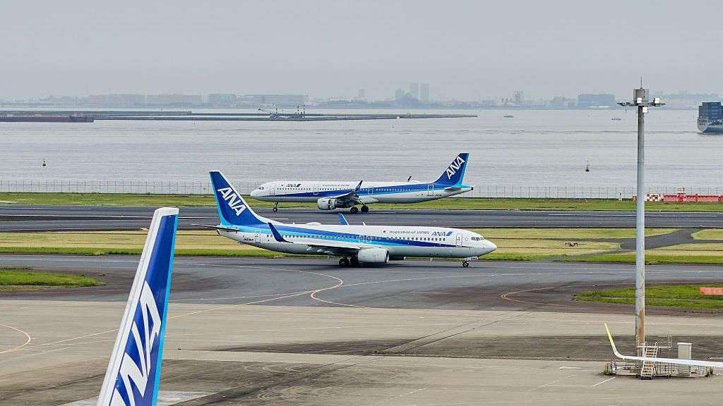 Japan flight made emergency landing after man tried opening door
