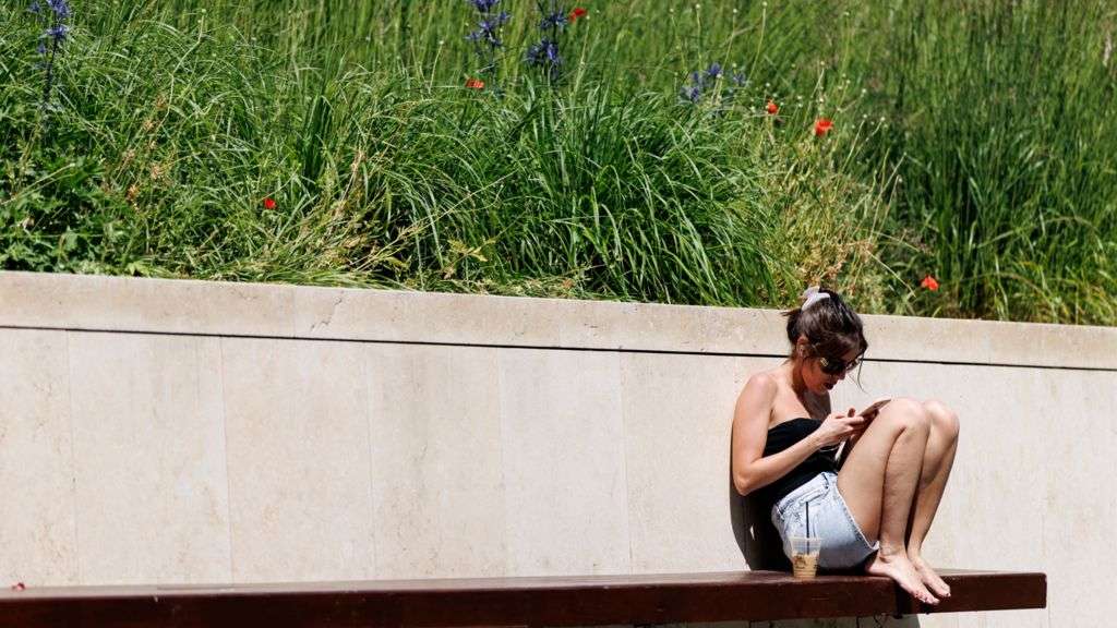 UK has warmest day of year as amber thunderstorm warning issued
