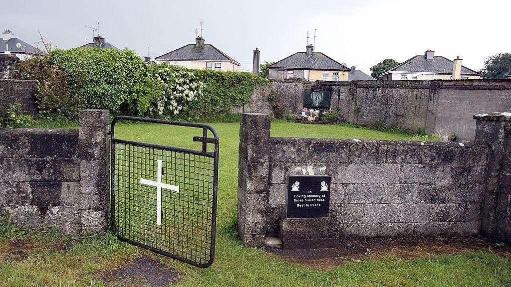 Pre-excavation work begins at mass burial site